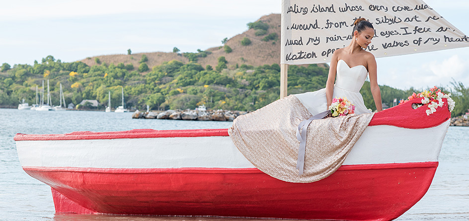 bride on a red and white boat on the water